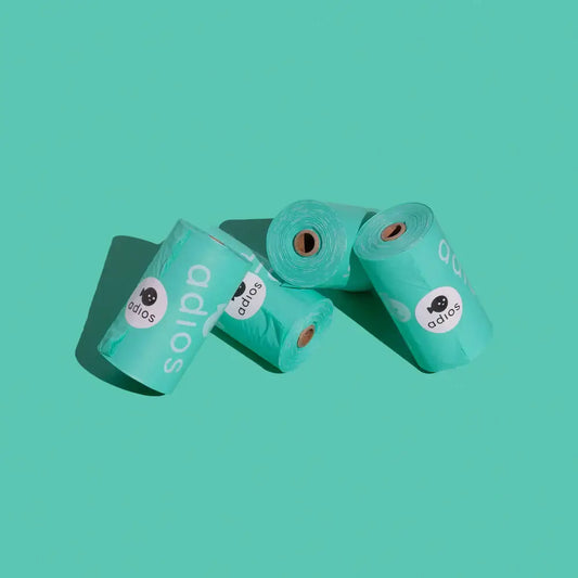 Image of four Mint coloured Adios poo bags, biodegradable poop bags for dogs 