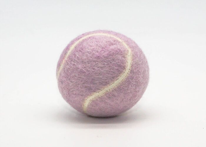 Image of a lavender coloured tennis ball - Dog toy